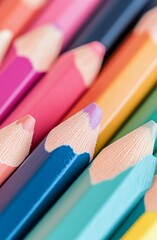 Fototapeta premium Colorful assortment of pencils arranged on a flat surface for creative activities