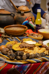 vertical traditional bolivian and aymara food on cloth called aguayo - concept of traditional food