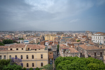 Obraz premium Catania, Italy - May 18, 2024: Cityscape view from the observation deck on top of San Nicolo l'Arena church.