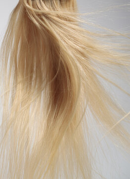 blond hair extension flying 