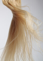 blond hair extension flying 