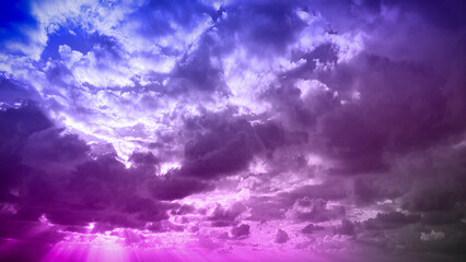 Majestic sky with vibrant clouds in shades of purple, pink, and blue, creating a serene natural background perfect for 4K wallpapers, banners, or backdrops