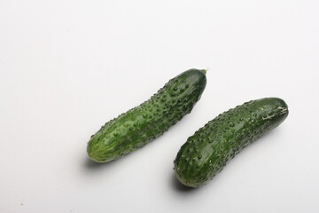 cucumbers on a wooden board