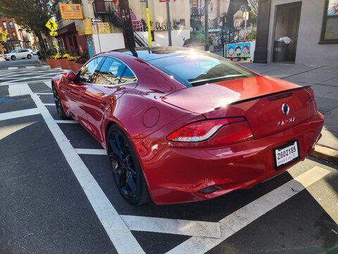 New York City, USA - October 24, 2023: Fisker Karma Revero red sport car, back angle view