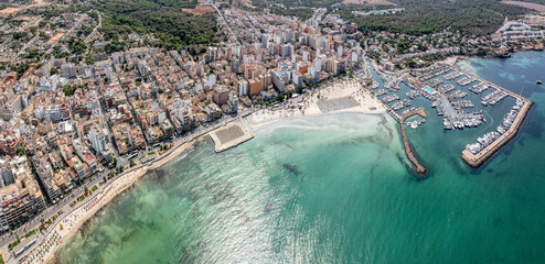 aerial cityscape view of S'Arenal a village located on Mallorca, a Balearic Island, south of Palma de Mallorca with harbor and buildings  © Mario Hagen