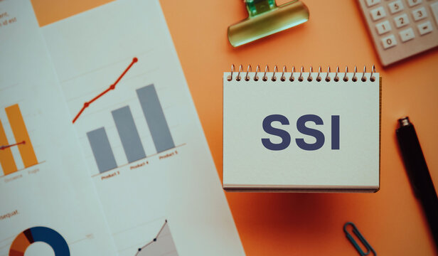 There is notebook with the word SSI. It is an abbreviation for Self Sovereign Identity as eye-catching image.