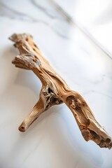 Close up shot of a small piece of driftwood on a clear glossy tabletop  AI generated illustration