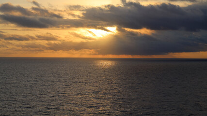 Fototapeta premium Caribbean sunrise with dark morning clouds