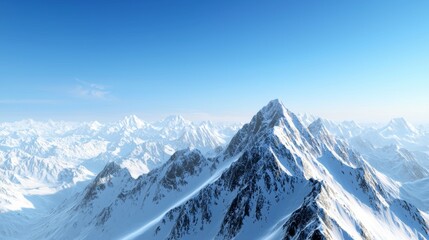 Obraz premium Majestic mountain range with snow-capped peaks and clear blue sky above. Majestic Mountain Range