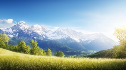 Fototapeta premium Majestic mountain range with snow-capped peaks and clear blue sky above. Majestic Mountain Range