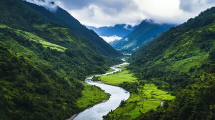 Naklejka premium A peaceful valley surrounded by lush green mountains and gentle river flowing through it. Serene Mountain Valley