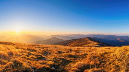 Fototapeta premium Golden Sunset Over Mountain Range