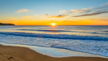 Sunrise at the seaside with high cloud