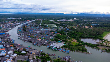 Fototapeta premium Aerial view of fishing village and gulf at Pak Nam Sichon, estuary area in Chumphon Province, Thailand.