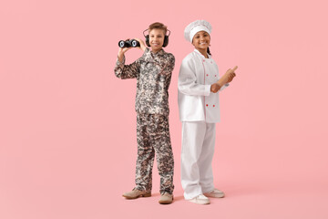 Teenage soldier and chef on pink background. Professions concept
