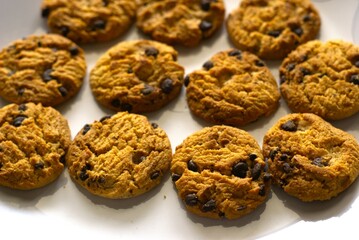 Close up of chocolate cookies on white plate