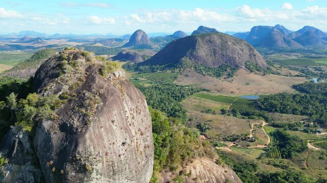 Aerial drone footage of a rocky mountain range in the rural area of Aguia Branca, Espirito Santo, Brazil