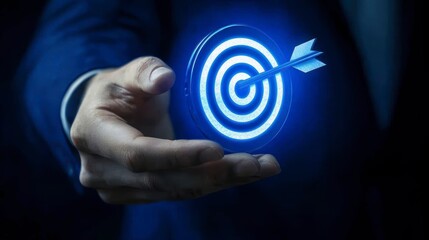 Fototapeta premium Businessman holding a target with an arrow, symbolizing success and achieving goals in digital marketing