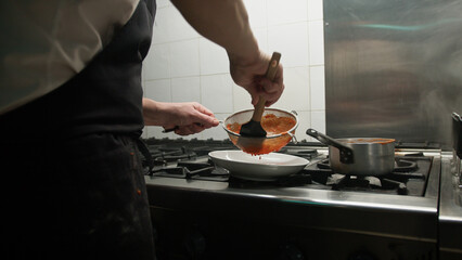 Preparing The Tomato Cream For A Gourmet Dish 