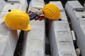 yellow helmet on a work site