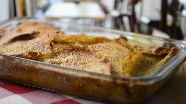 Close-up video pan of Timballo: layers of crepes, artichokes, meat, cheese, B&eacute;chamel sauce, from Abruzzo, Italy.