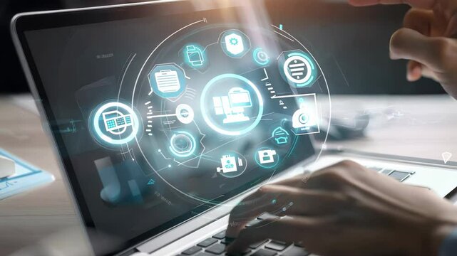 A person interacting with a laptop, visualizing digital icons and data flow, showcasing modern technology and innovation.