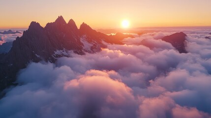 Fototapeta premium Mountain Peaks Emerging Through Sunset Clouds