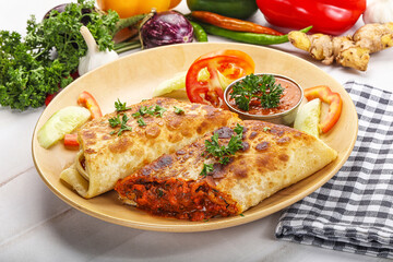 Mexican cuisine - chicken burrito with beans