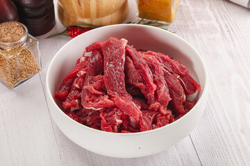 Raw beef meat - sliced strips