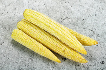 Raw sweet baby corn heap