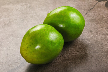 Two ripe green exotic avocado fruit