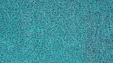 Plastic fiber texture of doormat.