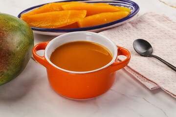 Sweet mango puree in the bowl