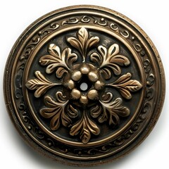 A close-up view captures the antique brass button's intricate ornate design, with delicate filigree details surrounding a central hole.