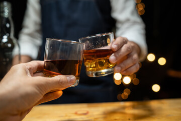 Celebrate whiskey on a friendly party in restaurant