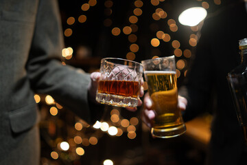 Celebrate whiskey on a friendly party in  restaurant.