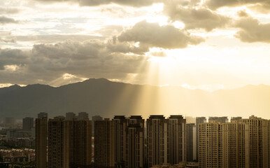 City buildings under the sunset