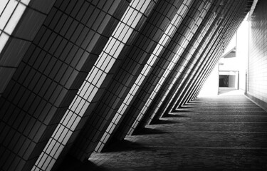 Fototapeta premium An empty triangular corridor of the city