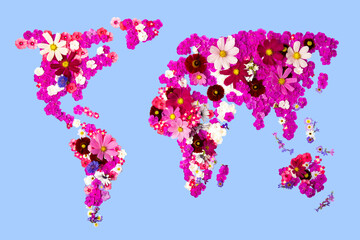 Composition of summer purple, white, pink flowers in shape of world map isolated on blue...
