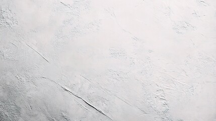 White Concrete Texture: A close-up shot of a textured white concrete wall, showcasing the subtle imperfections and variations in the surface.
