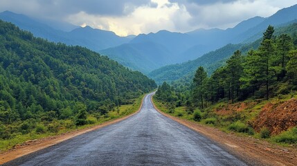 Naklejka premium photo of a narrow asphalt road in a mountainous area.