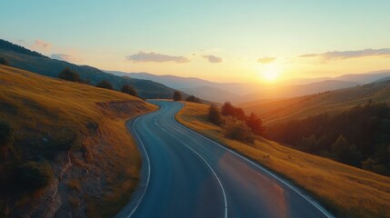 road in mountainous area at sunset. View from above