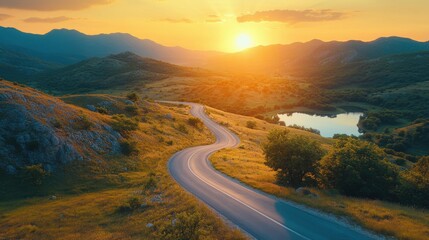 road in mountainous area at sunset. View from above