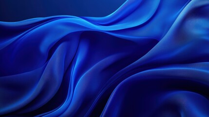 Fototapeta premium A smooth, flowing blue fabric texture creating a serene and elegant visual effect.