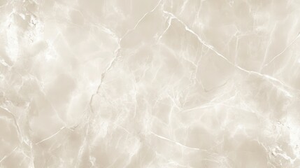 Fototapeta premium A smooth, light beige marble texture with subtle veins and patterns.