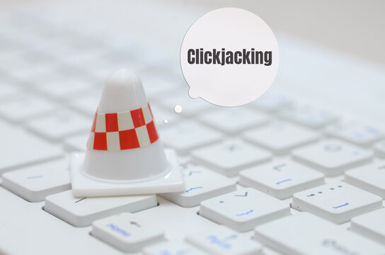 the concept of clickjacking, where malicious actors trick users into clicking on hidden elements, symbolizing the hidden dangers that lurk online.