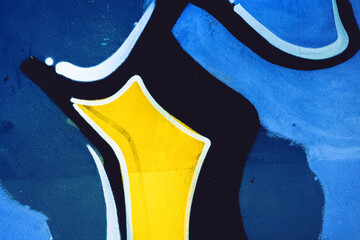 Closeup of colorful yellow, black, blue urban wall texture. Modern pattern for wallpaper design....