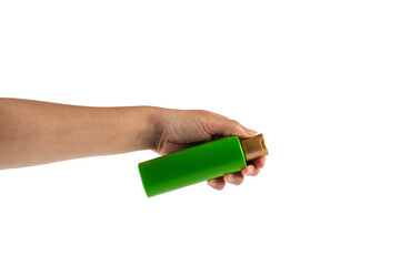 Green shampoo bottle in hand isolated on transparent background