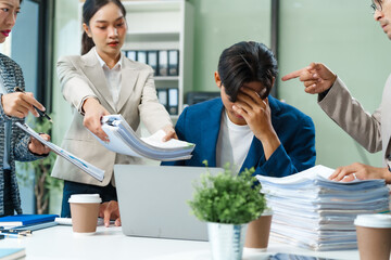 Stressed business person in a demanding career struggles with emotional burnout, overwhelmed by tasks and deadlines. exhausted and frustrated, seeking moment of relief amid her challenging workload.