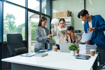 Stressed business person in a demanding career struggles with emotional burnout, overwhelmed by tasks and deadlines. exhausted and frustrated, seeking moment of relief amid her challenging workload.